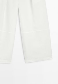 White wide-leg pants with visible horizontal seams near the hem, displayed on a plain light background.