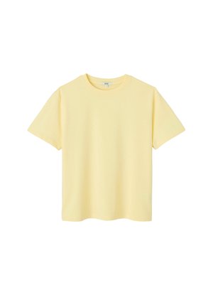 T-shirt uni jaune pâle à manches courtes et col rond, présenté sur un fond blanc.