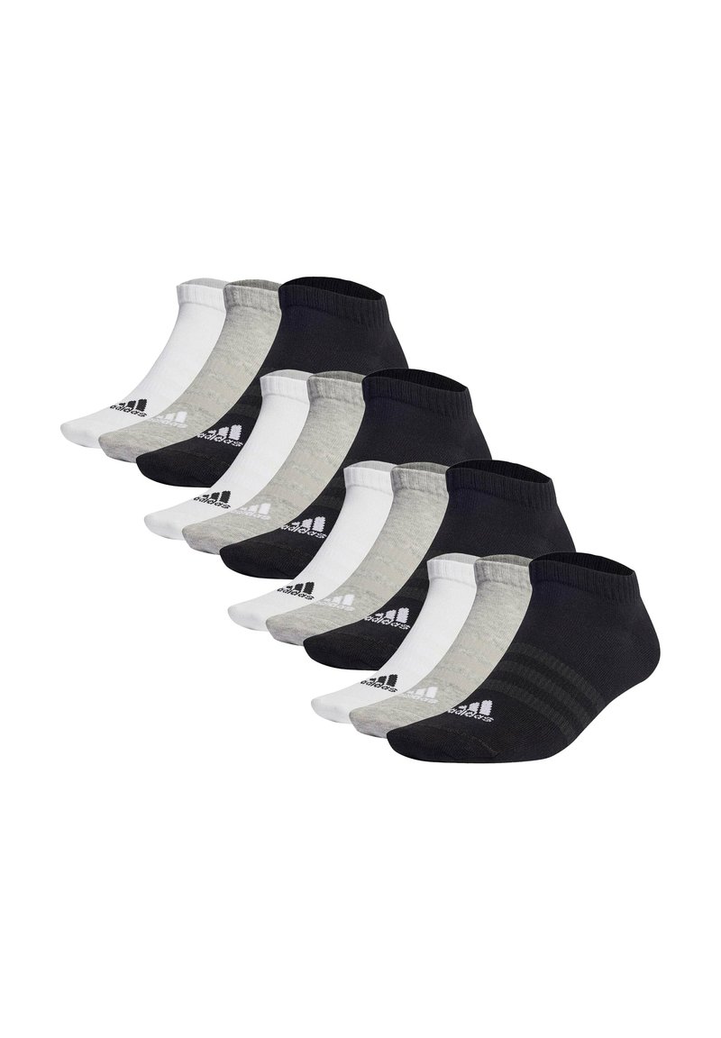 Set med 10 båda strumpor i svart, grått och vitt. Material av bomullsblandning, logotyp på sidan, varierade mönster och färger.