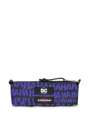 Purple pencil case with "HAHAHA" print, featuring zipper closure, black logo patches for DC and Eastpak, and a textured, durable fabric.
