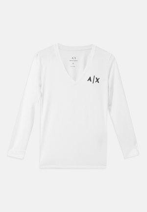 Balta ilga rankovė V-kaklo marškinėliai pagaminti iš medvilnės, su mažais juodais logotipais "A/X" kairėje pusėje, arti krūtinės. Lygus paviršius.