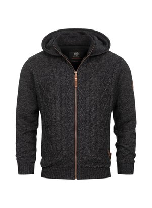 Sudadera con cremallera negra con patrón de punto de cable, cuenta con una capucha, puños y dobladillo acanalados, y detalles de cremallera en bronce. Fabricada con tejido texturizado.