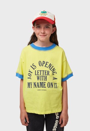 JOY UNISEX - Camiseta estampada - pale-yellow