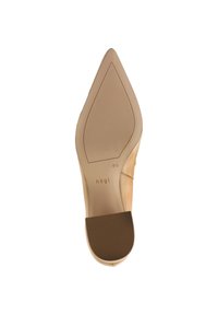 Beige high-heeled shoe sole with a pointed toe. Smooth finish with a rubber grip pattern at the heel and brand lettering "högel" visible.
