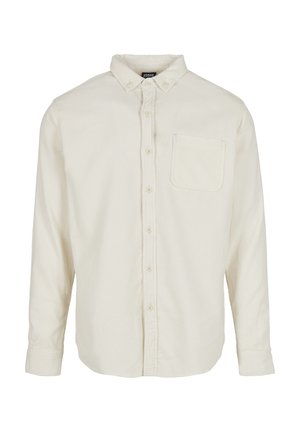 Lichtbeige overhemd met lange mouwen, een button-down kraag, een voorzak en gestructureerde stof. Vijf knopen aan de voorkant. Klassieke pasvorm.