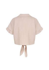 Blusa corta a maniche corte di un rosa chiaro, realizzata in tessuto texturizzato, con colletto, maniche arricciate e chiusura a fiocco sul retro.
