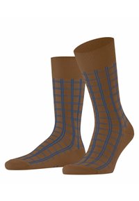 Braune Socken mit einem blauen Gittermuster, ausgestattet mit gerippten Bündchen und einer glatten Textur. Entwickelt für Komfort und Stil.
