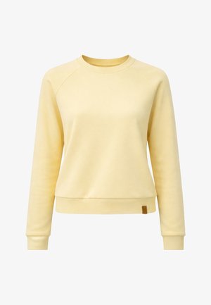 Soft yellow long-sleeve crewneck sweatshirt with ribbed cuffs and hem, featuring a small brown tag on the bottom left side.