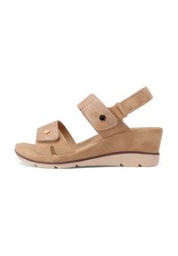 Sandali con zeppa marrone chiaro, con una fascia anteriore testurizzata e cinturino alla caviglia regolabile. Materiale in suede morbido, soletta sagomata e suola in gomma.