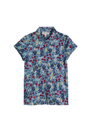 Chemise à manches courtes boutonnée avec un fond bleu et un motif floral composé de feuilles rouges, jaunes, blanches et bleu marine.