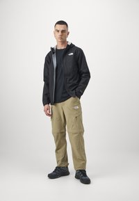 The North Face HIGHER RUN RAIN JACKET - Waterproof jacket - black