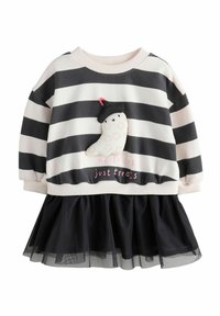 Felpa a righe con una palette in bianco e nero, caratterizzata da un morbido e soffice applicazione di fantasmini e un design testuale sulla parte inferiore con gonna in tulle.