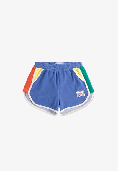 Shorts en éponge bleus avec une bordure blanche, présentant des accents latéraux orange, jaune et vert, et un logo de marque carré sur le devant.