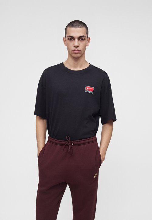 Nike Pantalones deportivos - burgundy crush/metallic gold-coloured — photo 4
