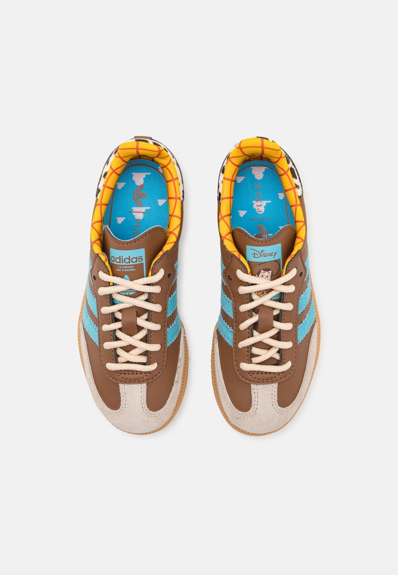 adidas Originals PIXAR SAMBA OG KIDS - Trainers - preloved brown/preloved  blue/alumina/brown - Zalando.co.uk