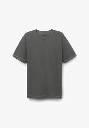 Šedé bavlněné tričko s kulatým výstřihem, krátkými rukávy a volným střihem. Hladká textura a minimalistický design bez viditelných log.