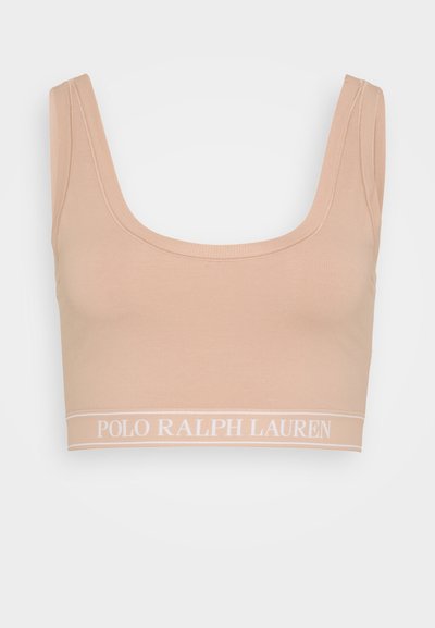 Béžový skrátený bralet vyrobený z mäkkej látky, s širokým krytým výstrihom, širokými ramienkami a bielym pásom s logom "POLO RALPH LAUREN".