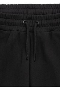 UNFAIR ATHLETICS INSPIRED EASY FIT - Šortky - black