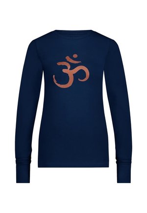 Laine pitkähihaista t-paitaa, joka on valmistettu pehmeästä kankaasta ja jossa on kuparinvärinen symboligrafiikka edessä. Muotoiltu malli, jossa on röyhelöhuulet.
