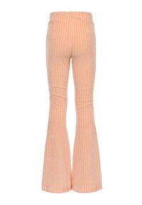Ripcord-broek in zacht perzikkleur met verticale ribbels. Voorzien van een uitlopende zoom en elastische tailleband voor comfort. Soepele textuur zonder zakken.