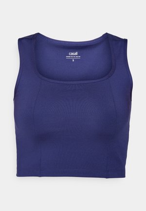 Marineblå treningstopp med kort lengde, laget av glatt, elastisk stoff. Den har rund hals og brede stropper, med en tettsittende silhuett og minimalt med sømmer.