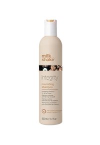 Voedende shampoo-fles, 300 ml, beige plastic met een witte pompdeksel. Etiket met bruine tekst die organische muru muru benadrukt, vrij van sulfaten en parabenen.