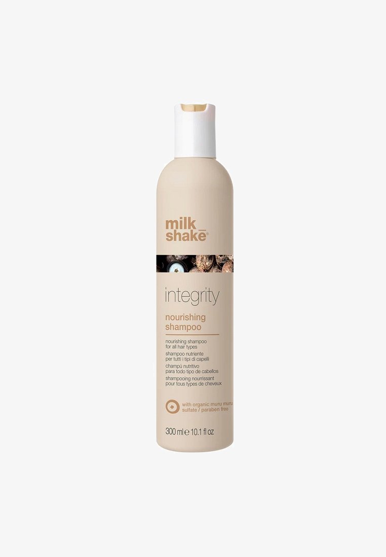 Voedende shampoo-fles, 300 ml, beige plastic met een witte pompdeksel. Etiket met bruine tekst die organische muru muru benadrukt, vrij van sulfaten en parabenen.