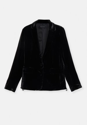 Black velvet blazer with long sleeves, notch lapel, single button closure, and two front pockets. Smooth texture and tailored fit.