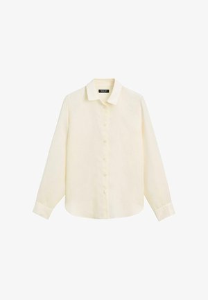 Kremowa koszula na długi rękaw z guzikami, kołnierzykiem i mankietami, prezentowana na białym tle, etykieta widoczna wewnątrz kołnierza.