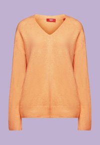 Sweter w koloru brzoskwiniowego, dzianinowy, z dekoltem w serek, opadającymi ramionami i ściągaczami na mankietach. Miękka faktura i luźny krój.