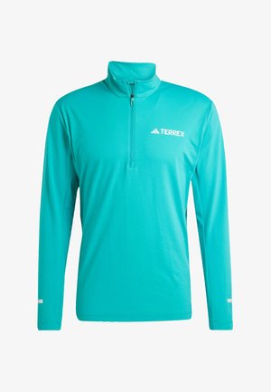 Türkiser Pullover mit langen Ärmeln und Reißverschlusskragen, aus glattem Stoff; verfügt über ein weißes "TERREX"-Logo auf der linken Brust und weißen Akzenten.