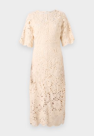 Robes en dentelle de couleur beige doux avec des découpes florales, manches courtes, col rond et ourlet festonné, mettant en valeur une texture et un design élaborés.