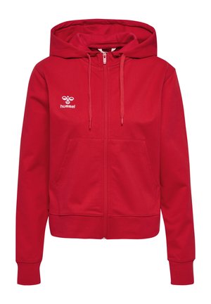 Rød zip-up hoodie lavet af en bomuldsblanding, med en frontlomme, snoretræk til hætten og hvidt logo på venstre bryst.