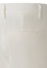 White trousers featuring a smooth texture, back pocket with a subtle seam, and belt loops for a structured appearance.