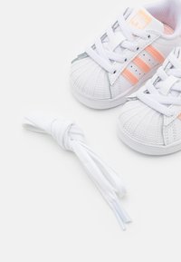 adidas gazelle silver green womens adidas Predator Elite Firm Ground Cleats - Unisex - Signal Coral / Cloud White / Beam Orange main image 0