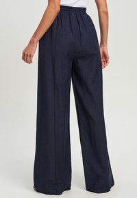 TUSSAH ANDREA - Hlače - navy blue