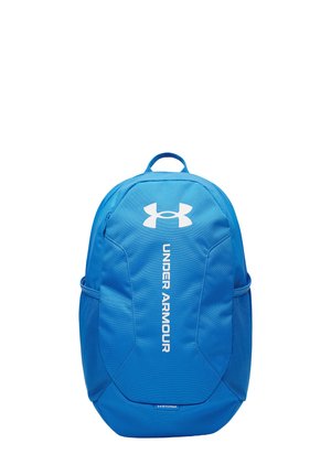 Blue backpack made of durable fabric, featuring a top handle, side mesh pockets, and large front logo with a sleek, sporty design.