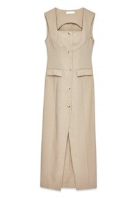 Beige ærmeløs kjole med firkantet halsudskæring, forreste knapper og to lommer, der har en slidser til låret og struktureret stof.