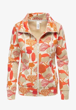 Sweat-shirt zippé à motif floral en crème, avec des arbres orange et rouges, texture douce, poignets côtelés et col haut.