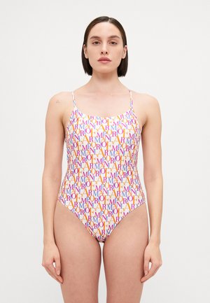 One-piece swimsuit with thin straps, featuring a colorful all-over text pattern in orange, pink, and purple on a white background.