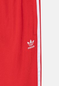 adidas Originals Träningsbyxor - better scarlet