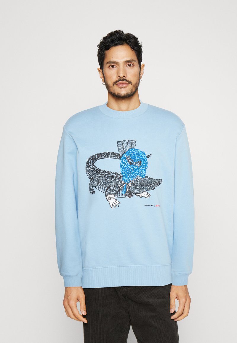 Lacoste LACOSTE X NETFLIX - Sweatshirt - light blue/hellblau - Zalando.ch