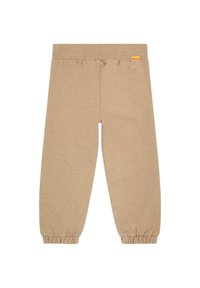 Pantalones jogger de algodón beige con cintura elástica y puños fruncidos, que presentan un pequeño logo de oso en la cadera izquierda.