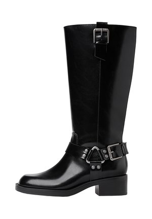 Black leather knee-high boot with a rounded toe, a chunky heel, adjustable strap with hardware accents, and a glossy finish.