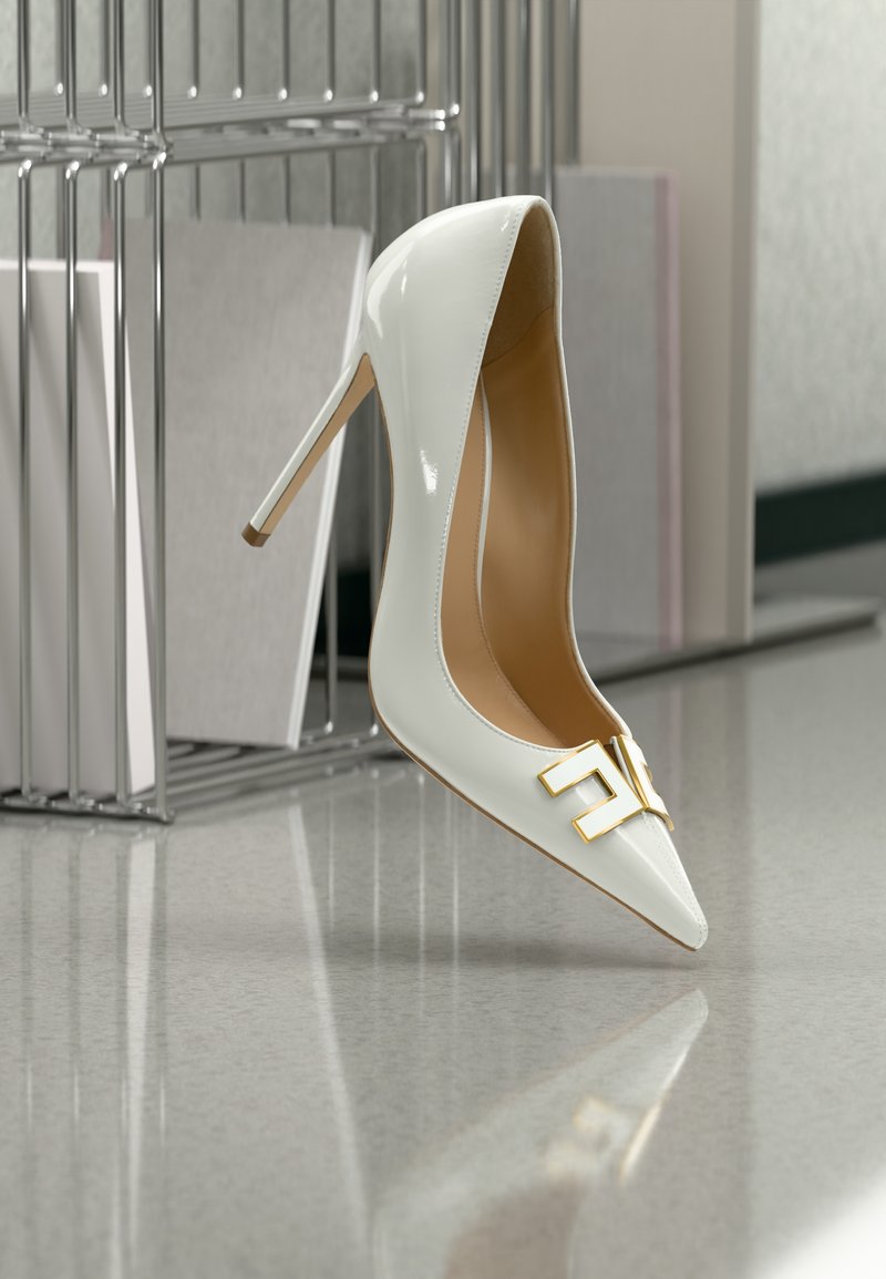 White patent leather high-heeled pump with a pointed toe, featuring a gold geometric buckle accent and a sleek, glossy finish.