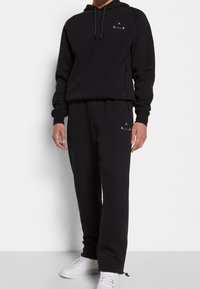 Jordan Träningsbyxor - black