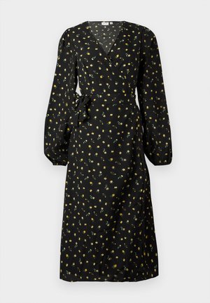 Black wrap dress with long puff sleeves, featuring a yellow floral pattern. Cinched waist with a fabric tie. Smooth, lightweight material.