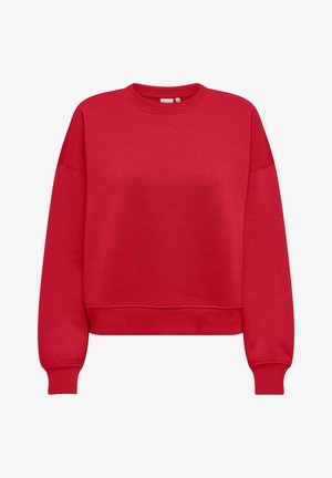 Κόκκινο φούτερ από μαλακό ύφασμα, με στρογγυλή λαιμόκοψη, χαμηλωμένους ώμους και ριμπ σημεία στους καρπούς και το στρίφωμα. Κοντή σχεδίαση με λείο υφή.