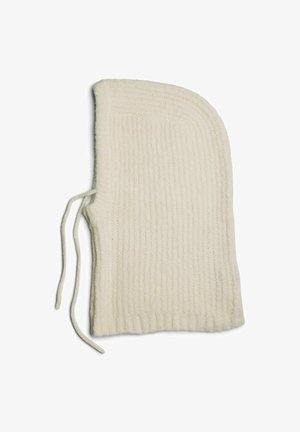 Strikket cremefarvet uldhat med ribbet tekstur, rund form og snore til justering. Blødt materiale med et hyggeligt udseende.