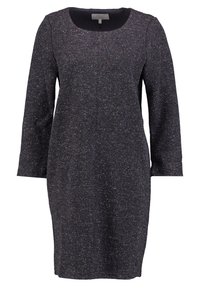 Robe en maille gris foncé avec de subtiles touches multicolores. Comprend des manches longues, un col rond et une silhouette ajustée.